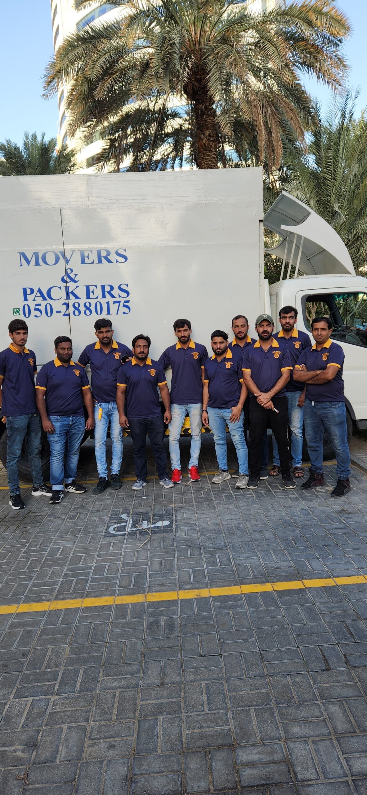 ALT Movers team packing and moving furniture in Dubai